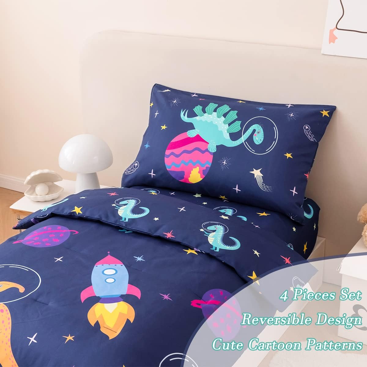 PERFEMET Toddler Bedding Set 4 Pieces Cartoon Dinosaur Planet Printed Bed in A Bag for Boys Girls Reversible Navy Blue Toddler Comforter with Sheet Set for All Season(Navy, Dinosaur/Planet/Rocket)