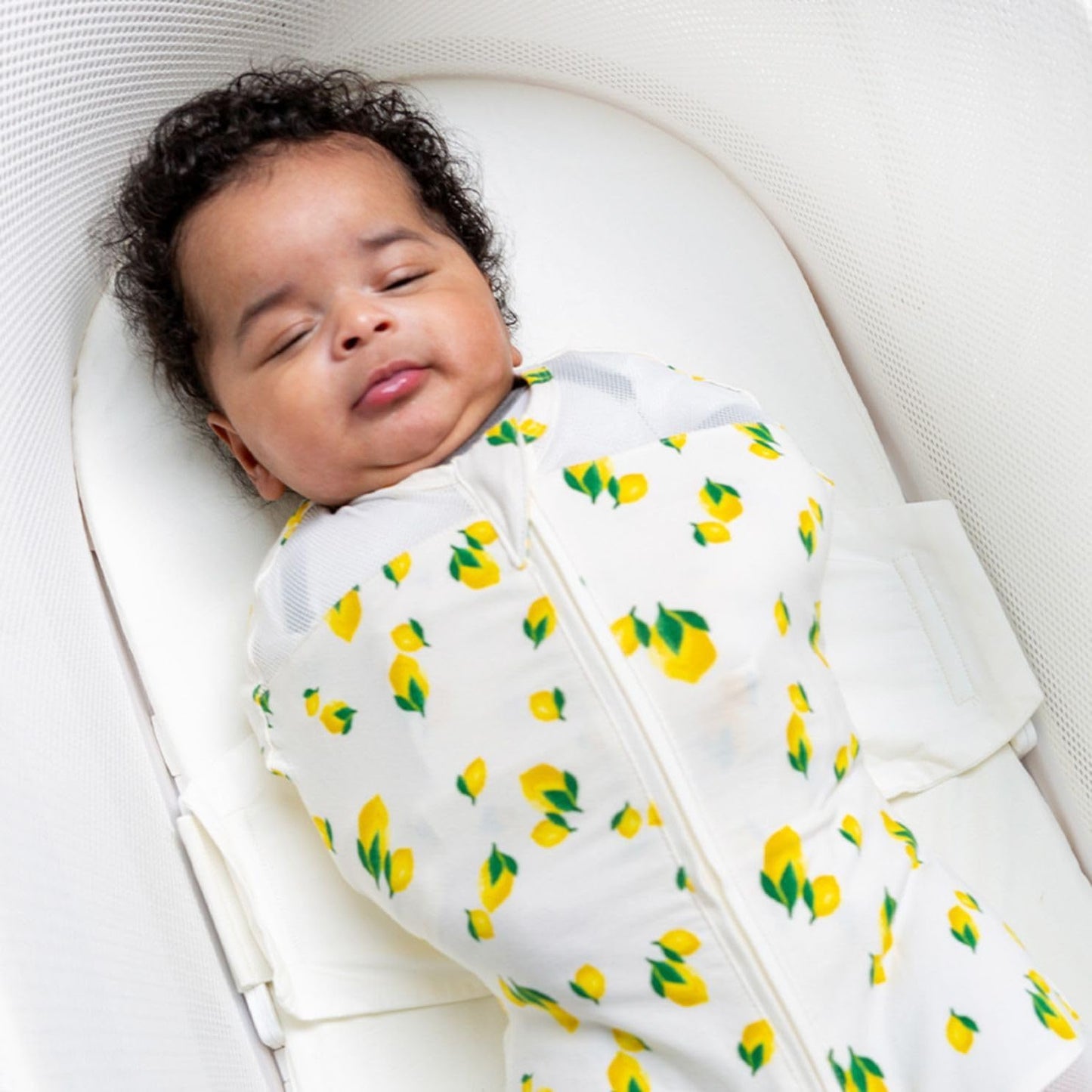 Happiest Baby SNOO Sleep Sack - 100% Organic Cotton Baby Swaddle Blanket - Doctor Designed Promotes Healthy Hip Development (Ivory Lemons, Medium)