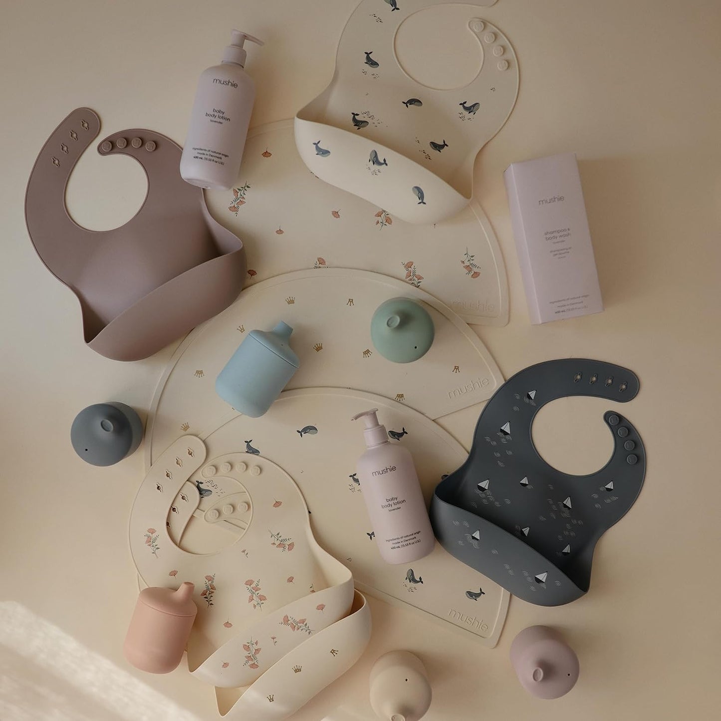 mushie Silicone Baby Bib | Adjustable Fit Waterproof Bibs (Pink Flowers)